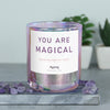 sku:m1-you-are-magic-6412139-marrake | you are magical | moments, Funkelnde Sojawachs Duftkerze mit frechem Spruch und aufregendem Duft, ideal als lustiges handgemachtes Geschenk